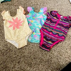 Girls three one piece bathing suits , size 3t
